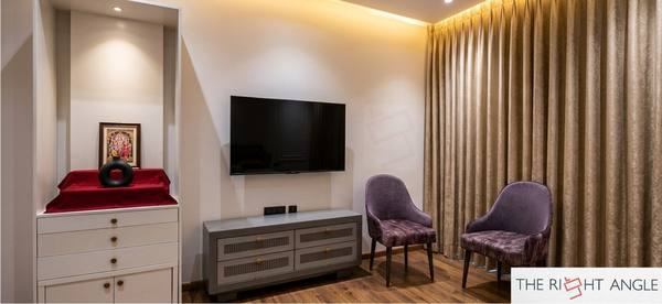 TV Unit with Purple Chairs